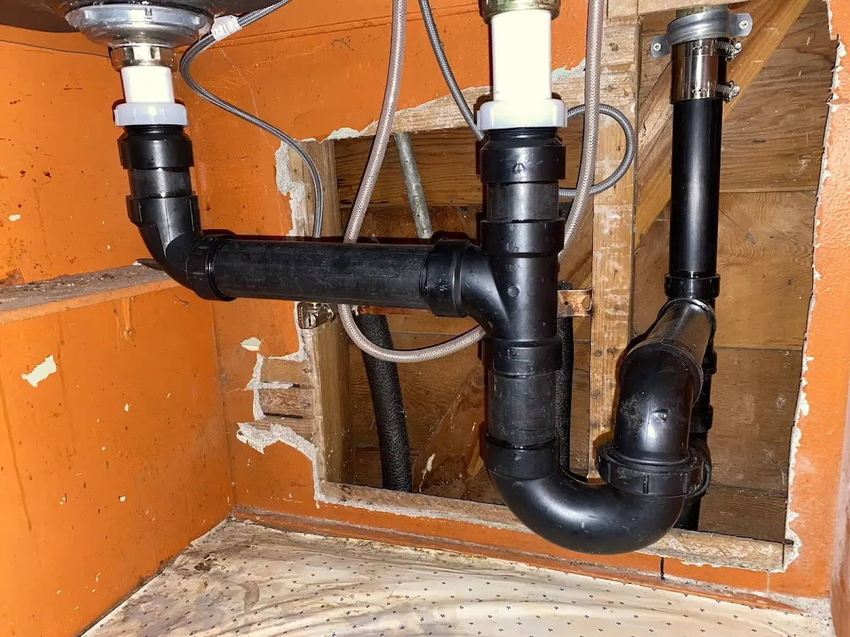 Professional Garbage Disposal Repair equipment and tools on the job in Minnetonka